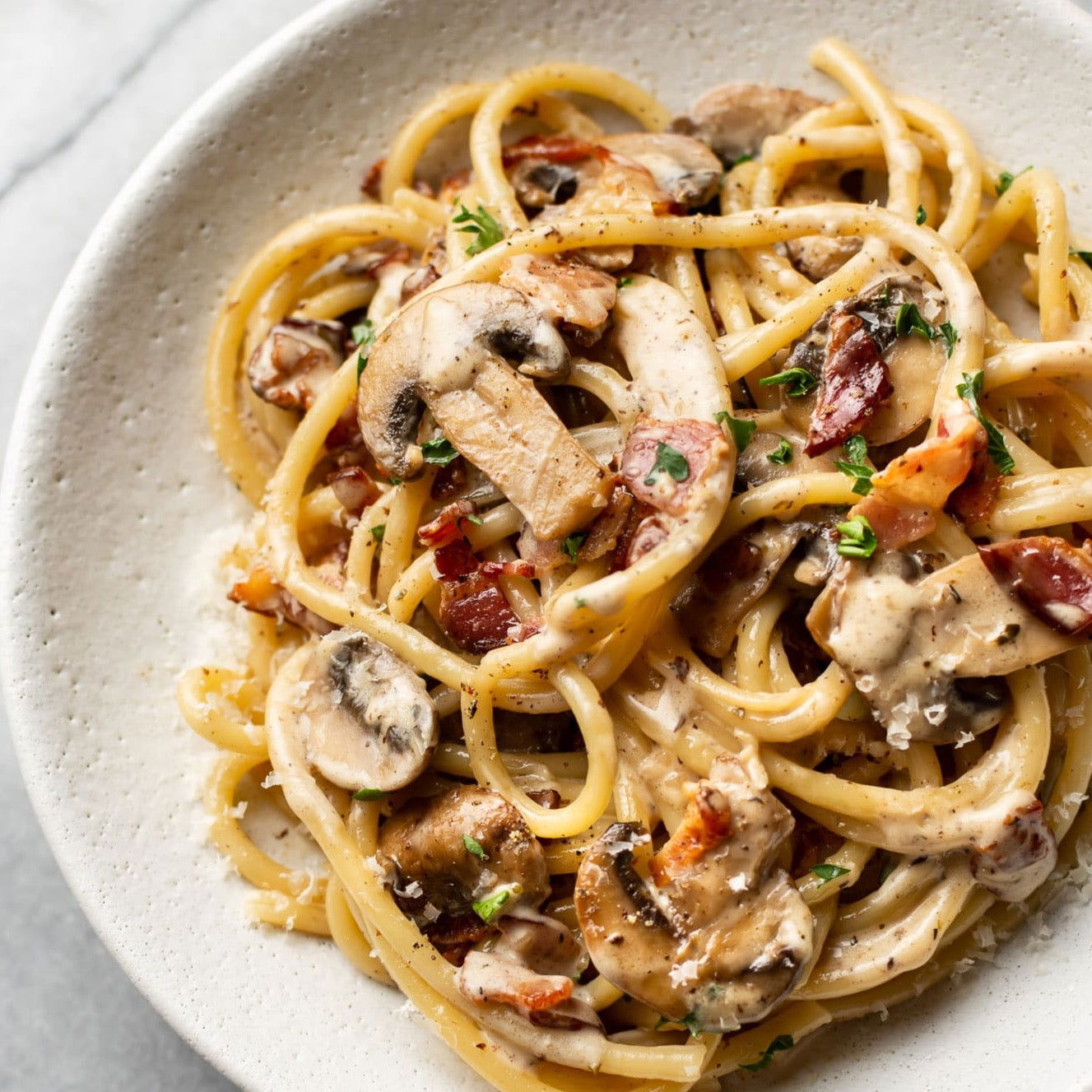 Crispy bacon & Mushroom spaghetti with a creamy garlic & wine sauce & herb crumb. - Arctic Kitchen NZ