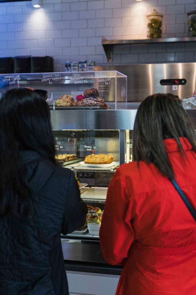 Customers looking in the cabinet at Arctic Kitchen cafe