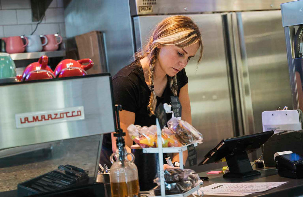 Staff working behind the counter at Arctic Kitchen Cafe 