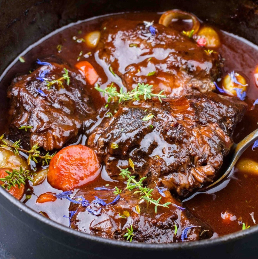 Tender slow cooked beef cheeks with a rosemary & red wine sauce.