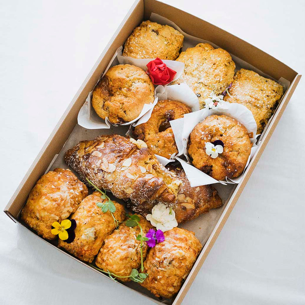A platter of baked scones, muffins and banana bread for morning/afternoon tea  