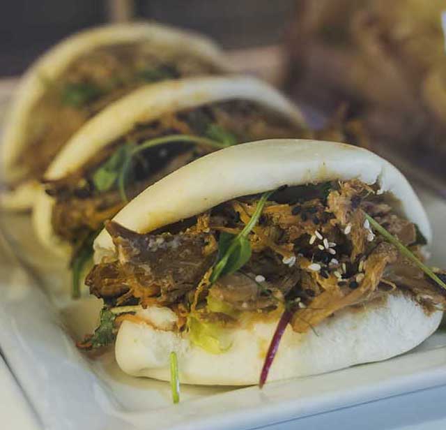 BBQ pork bao buns - one of the larger bites catering options
