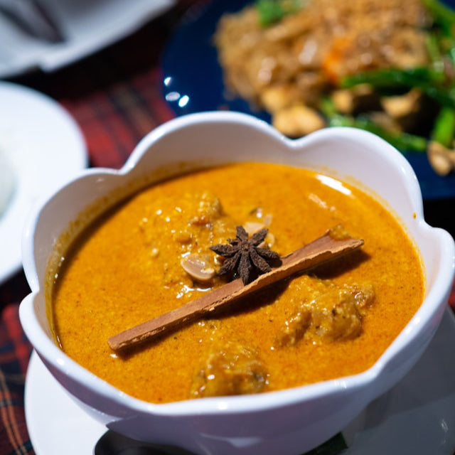 Royal Cambodian coconut beef cheek curry with peanuts, kaffir lime & lemongrass.